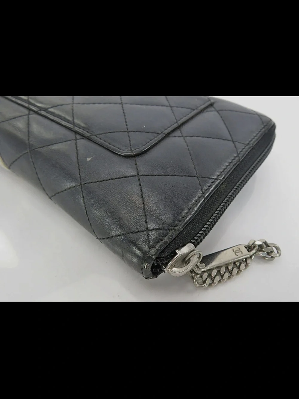 CHANEL Black Quilted Leather Zip Wallet with White CC Patch